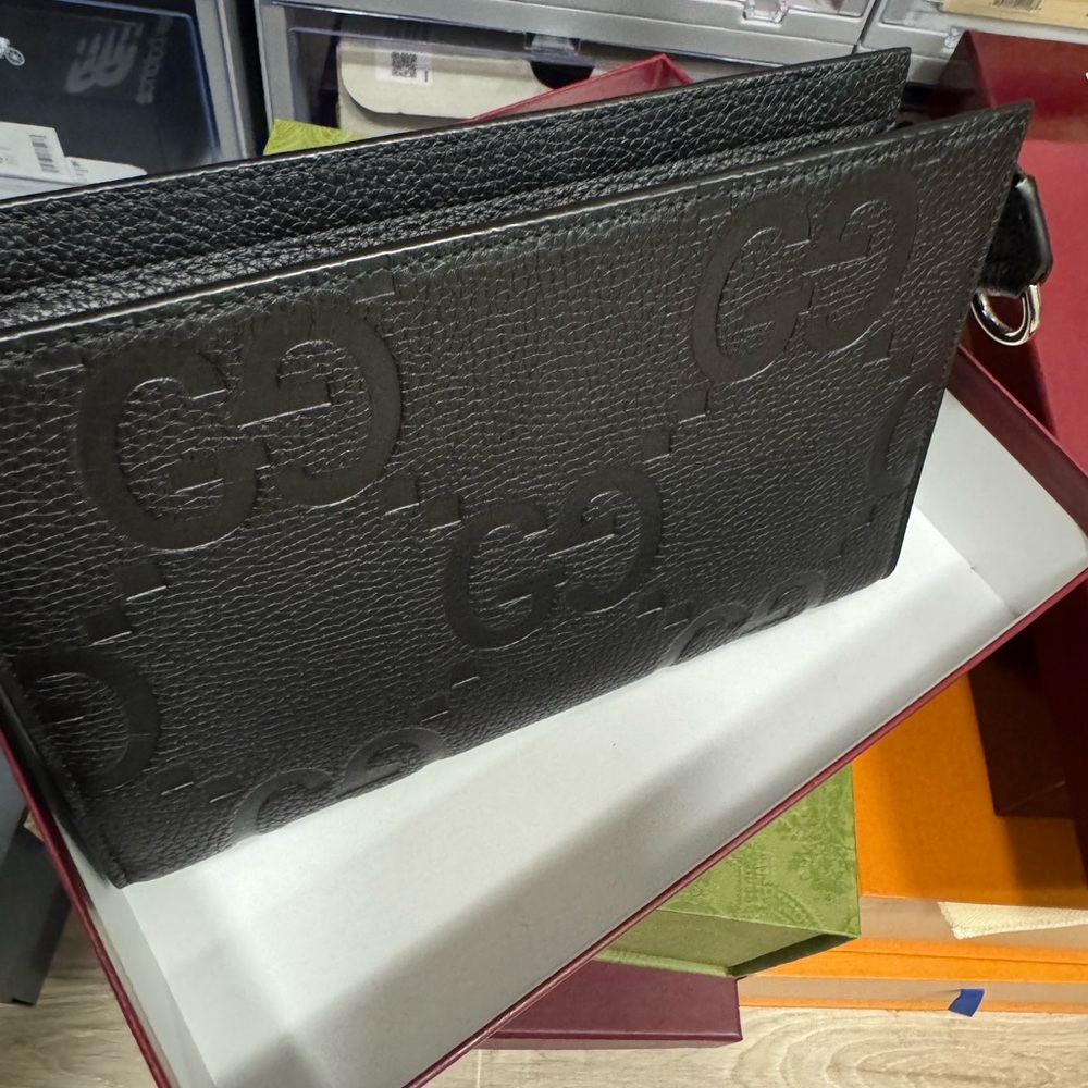 Gucci Black Leather Wallet with Iconic GG Embossed Pattern